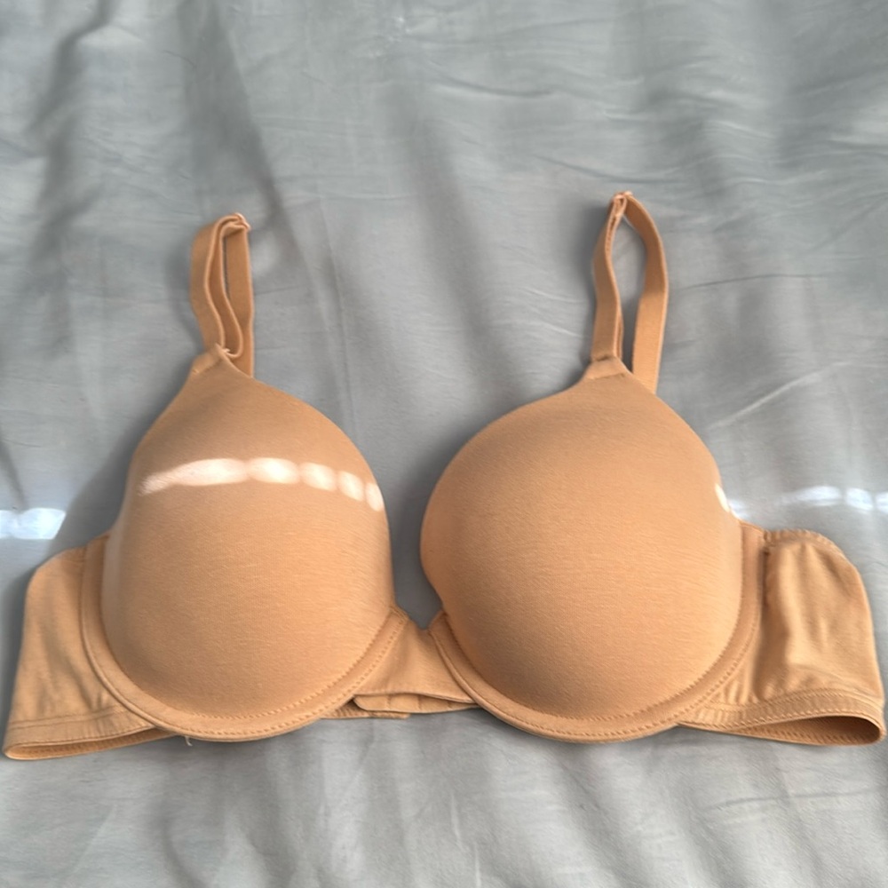 Tan fruit of the loom underwire cotton t-shirt bra. Size 38A